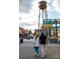 Charming community view featuring a rustic water tower and colorful shade structures at 1011 Carter Ave # 35, Charlotte, NC 28206