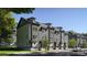 Modern townhomes with gray siding and black trim showcase a sleek, contemporary design and inviting curb appeal at 1011 Carter Ave # 35, Charlotte, NC 28206