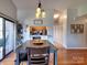 The dining area connects to the kitchen, showcasing hardwood floors and an open layout at 1022 Mallard Head Ln, Mooresville, NC 28117