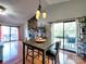 Living room with hardwood floors, fireplace, and sliding door to a patio at 1022 Mallard Head Ln, Mooresville, NC 28117