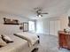 Bright main bedroom featuring a ceiling fan, area rug, large closets and natural light at 1022 Mallard Head Ln, Mooresville, NC 28117