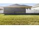 Image of a backyard showing vinyl fencing and green grass at 1063 Millview Ln, Matthews, NC 28104