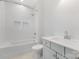Bright bathroom featuring a shower-tub combo and a stylish sink and vanity providing a clean, modern space at 109 Seldon Dr, Charlotte, NC 28216