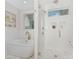Bright bathroom featuring a freestanding tub, glass-enclosed shower, and designer fixtures offering a luxurious feel at 109 Seldon Dr, Charlotte, NC 28216