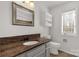 Bathroom with a granite countertop, vanity, and toilet at 11 Woodvine Ln, Clover, SC 29710