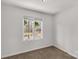 Sunlit bedroom with a large window offering views of the outdoors at 11 Woodvine Ln, Clover, SC 29710