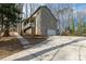 This home has great curb appeal and is complete with a driveway, garage, and trees at 11 Woodvine Ln, Clover, SC 29710
