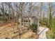 Charming two-story home with a welcoming porch, mature trees, and a well-maintained yard and driveway at 11 Woodvine Ln, Clover, SC 29710