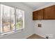 Laundry room featuring cabinets, and large window at 11 Woodvine Ln, Clover, SC 29710