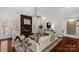 Bright living room with a vaulted ceiling, dark hardwood floors, and a modern fireplace feature at 11 Woodvine Ln, Clover, SC 29710