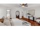 Bright main bedroom with hardwood floors, neutral decor, and en-suite bathroom access at 11 Woodvine Ln, Clover, SC 29710
