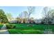 Apartment buildings with lots of grassy areas and trees at 1121 Myrtle Ave # 17, Charlotte, NC 28203