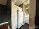 Eat-in kitchen with appliances and clean, white cabinets at 1121 Myrtle Ave # 17, Charlotte, NC 28203