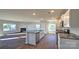Spacious kitchen with stainless steel appliances, a granite island, and an open layout at 12128 Lady Bell Dr, Charlotte, NC 28278