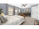 Light-filled bedroom with carpet, seating area, and views to the exterior at 12304 Huntersville Concord Rd, Huntersville, NC 28078