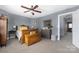 Cozy bedroom with classic furnishings, including a wooden dresser and decorative trunk at 12304 Huntersville Concord Rd, Huntersville, NC 28078