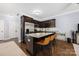Modern kitchen with granite countertops, stainless steel appliances, and bar stool seating at 12304 Huntersville Concord Rd, Huntersville, NC 28078