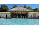 Community pool featuring a charming gazebo with plenty of seating at 12304 Huntersville Concord Rd, Huntersville, NC 28078