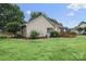 Exterior shot of the house with a deck and well-maintained lawn at 1278 Gracebrook Dr, Salisbury, NC 28147