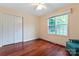 Cozy bedroom with hardwood floors, closet, large window and a ceiling fan at 1278 Gracebrook Dr, Salisbury, NC 28147