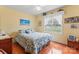 Bedroom with hardwood floors, yellow walls, a window and a ceiling fan at 1278 Gracebrook Dr, Salisbury, NC 28147