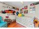 Fun bedroom with race car decor, hardwood floors, and colorful bedding at 1278 Gracebrook Dr, Salisbury, NC 28147