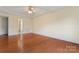 Spacious room with hardwood floors and a tray ceiling and neutral walls at 1278 Gracebrook Dr, Salisbury, NC 28147