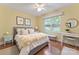 A staged bedroom features a plush bed and accent furniture with a bright window at 1278 Gracebrook Dr, Salisbury, NC 28147