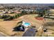 Aerial view of a community pool and clubhouse with ample parking and a baseball field nearby at 1278 Gracebrook Dr, Salisbury, NC 28147