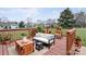 A staged outdoor deck with comfortable seating and green views at 1278 Gracebrook Dr, Salisbury, NC 28147