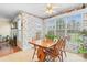 Sunny dining area featuring a classic table set and bright natural light through the big windows at 1278 Gracebrook Dr, Salisbury, NC 28147