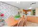 View of the dining room with wood table and chairs next to the kitchen at 1278 Gracebrook Dr, Salisbury, NC 28147