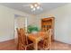 Inviting dining room featuring a classic wood table and chairs, complemented by natural light at 1278 Gracebrook Dr, Salisbury, NC 28147