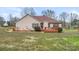 Back exterior view of home, deck, and landscaping at 1278 Gracebrook Dr, Salisbury, NC 28147