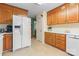 This kitchen has oak cabinets and stainless steel appliances at 1278 Gracebrook Dr, Salisbury, NC 28147