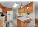 A well-appointed kitchen featuring ample counter space and modern appliances for culinary enthusiasts at 1278 Gracebrook Dr, Salisbury, NC 28147