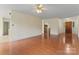 Spacious living room featuring hardwood floors and a ceiling fan with bright natural light at 1278 Gracebrook Dr, Salisbury, NC 28147