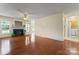Open-concept living area boasts hardwood floors, a fireplace, and natural light, perfect for gatherings at 1278 Gracebrook Dr, Salisbury, NC 28147