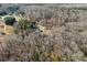 An aerial view of the home and property surrounded by bare trees at 1298 Hines Rd, Clover, SC 29710