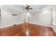 Large bedroom featuring hardwood floors, neutral walls, and tray ceiling at 1298 Hines Rd, Clover, SC 29710