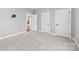Bedroom with carpet, neutral walls, and views of the fireplace in adjacent room at 1298 Hines Rd, Clover, SC 29710