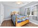 Comfortable bedroom with hardwood floors, natural light, and cozy decor at 1298 Hines Rd, Clover, SC 29710