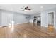 Living area features hardwood floors, a kitchen, laundry, and easy access to amenities at 1298 Hines Rd, Clover, SC 29710