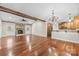 Open-concept living room with a fireplace and views into the kitchen at 1298 Hines Rd, Clover, SC 29710