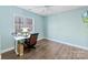 Home office with hardwood floors, and a large window for natural light at 1298 Hines Rd, Clover, SC 29710