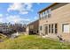 The backyard has a serene pond view and a well-maintained lawn at 13913 Queens Harbor Rd, Charlotte, NC 28278