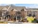 Charming townhome with a covered porch and attractive landscaping at 13913 Queens Harbor Rd, Charlotte, NC 28278