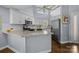 Modern kitchen featuring granite countertops and stainless steel appliances at 13913 Queens Harbor Rd, Charlotte, NC 28278