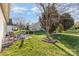 Beautiful backyard featuring a patio with seating and a lush, green lawn at 14014 Acorn Creek Ln, Charlotte, NC 28269