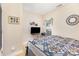 This bedroom features a flat screen tv, window with blinds, and stylish decor at 14014 Acorn Creek Ln, Charlotte, NC 28269